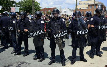 Riot police at protests in Charlottesville, USA, in August 2017. Image: Stephen Melkisethian/Flickr. Some rights reserved.